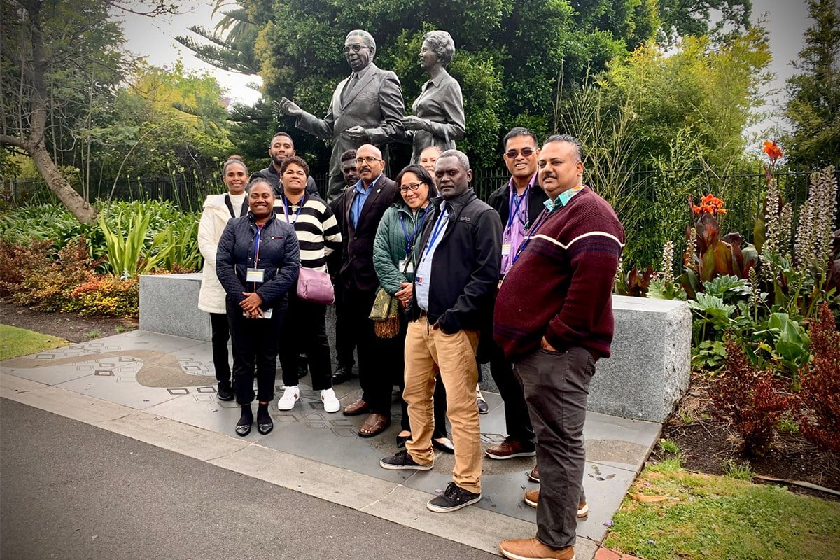Civic walk by Pacific Island staff included a visit to the statue of Pastor Sir Douglas and Lady Gladys Nicholls in Parliament Gardens.