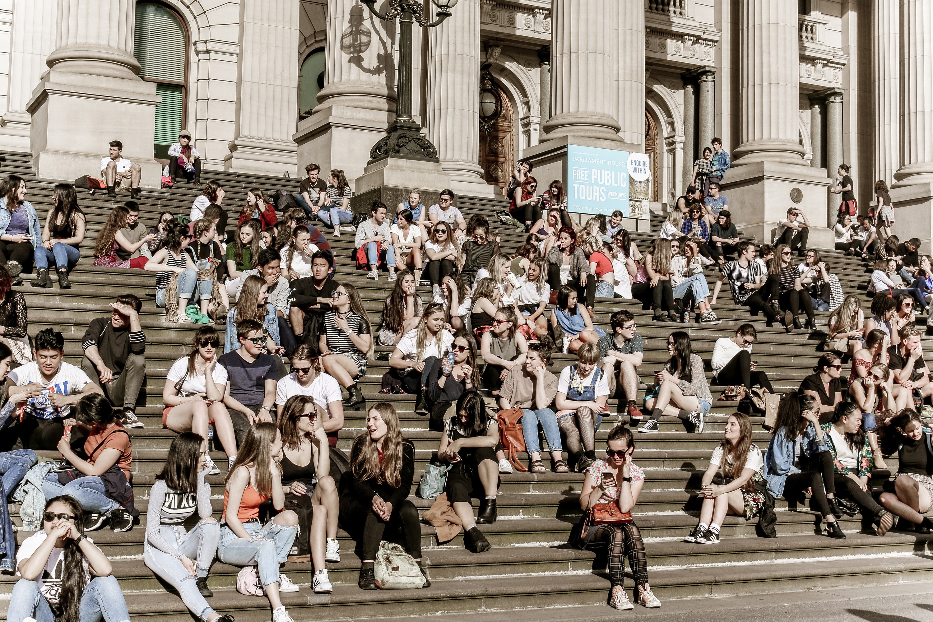 Young people on the steps of Parliament House