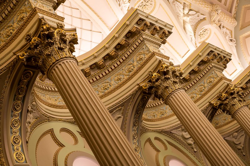 a row of Corinthian style columns in the Legislative Council chamber
