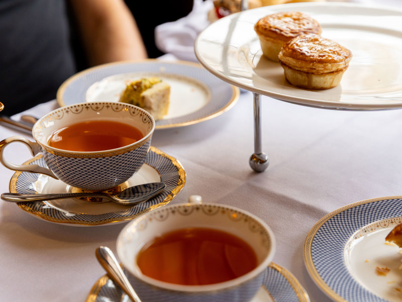 Tea, meat pies and sandwiches