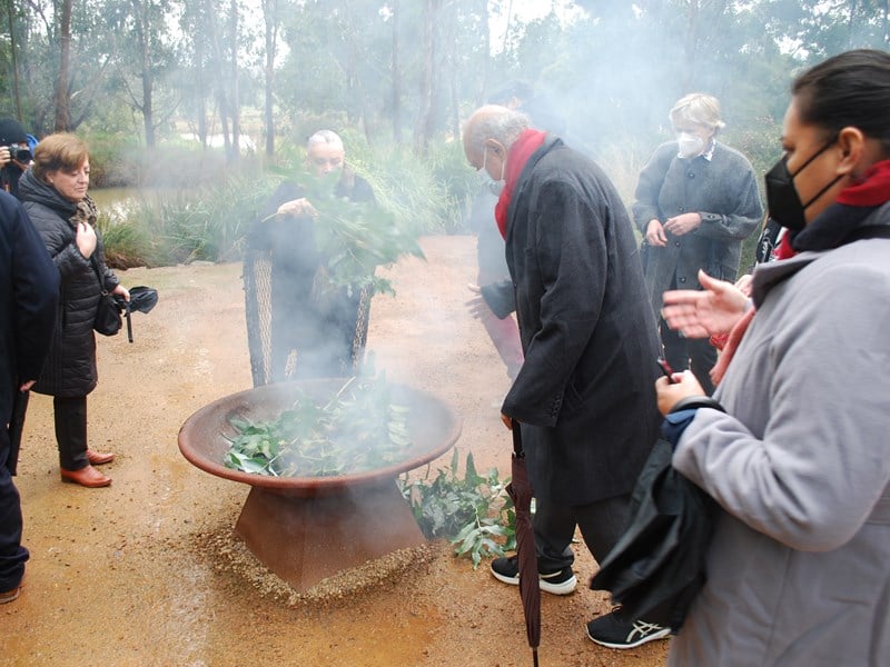 Parliamentary representatives participate in a smoking ceremony during their visit to Worawa Aboriginal College.